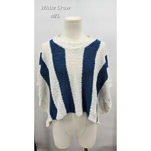 White Crow
Soft White and Navy Dohlman Sweater Top